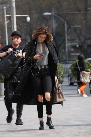 黑色长风衣美女姐姐